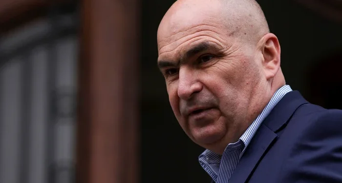 Criză politică în Parlament: moțiune de cenzură anunțată contra lui Bolojan